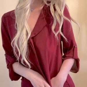 •deep maroon/red•dress shirt material•silver button details on the sleeves•